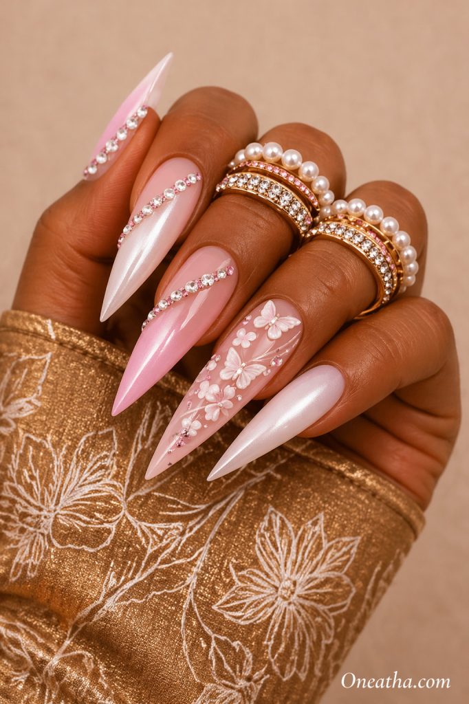 Pink butterfly nails by Oneatha.