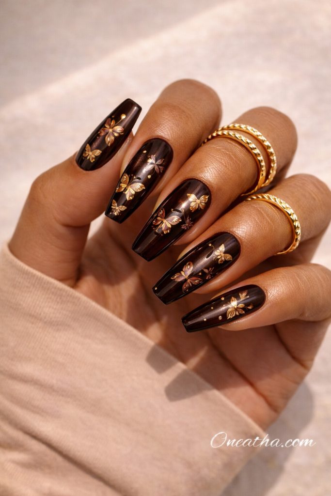 Brown butterfly nails by Oneatha.