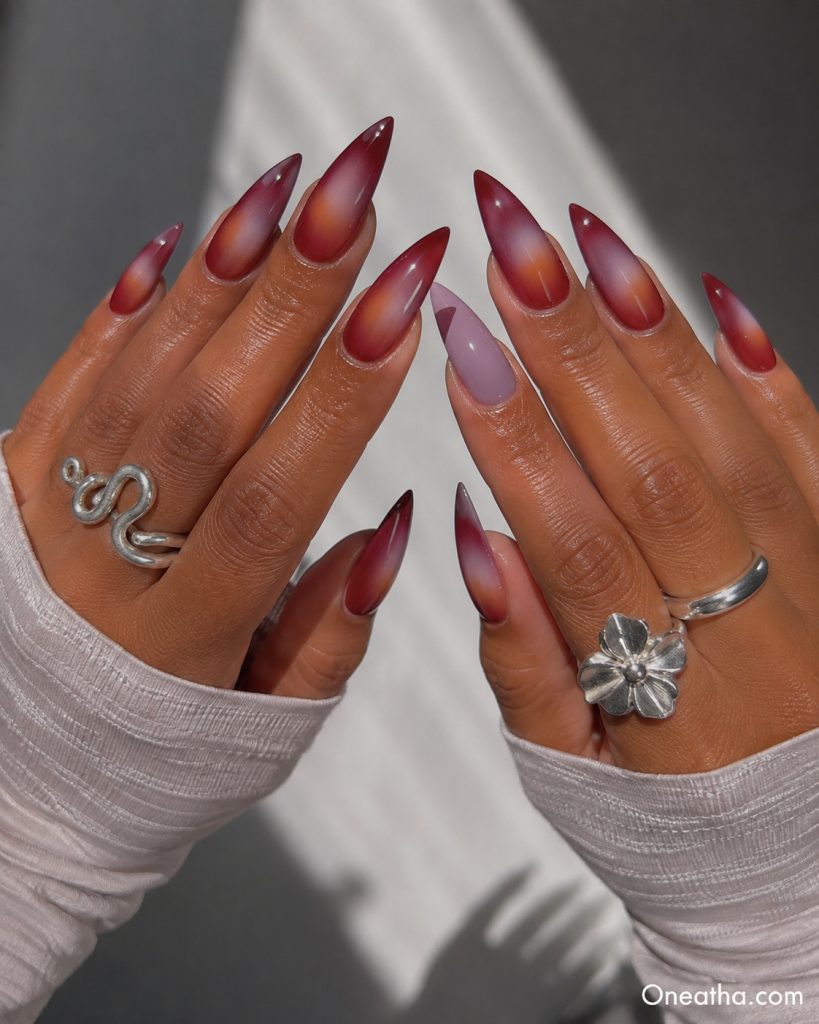 Aura Stiletto nails by Oneatha.