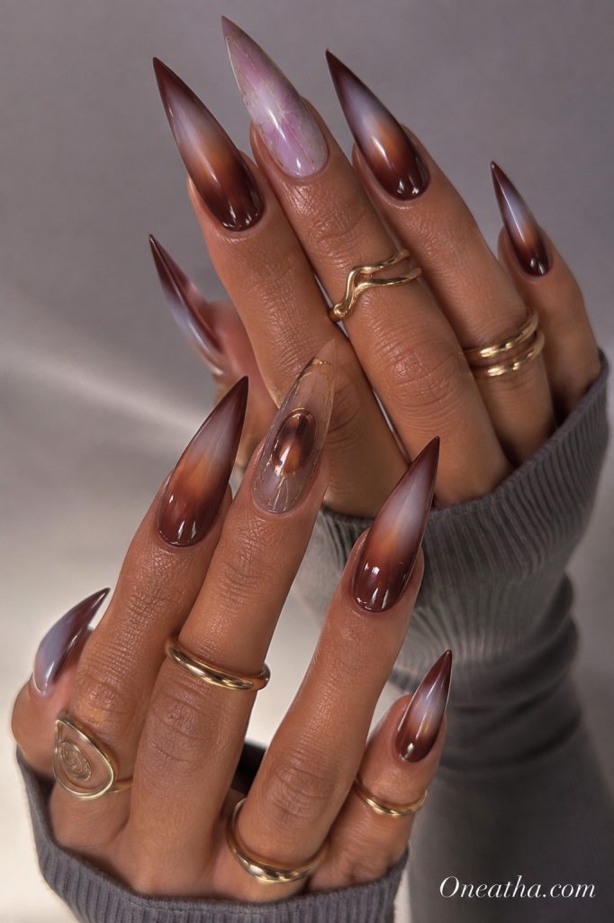 Aura stiletto nails by Oneatha