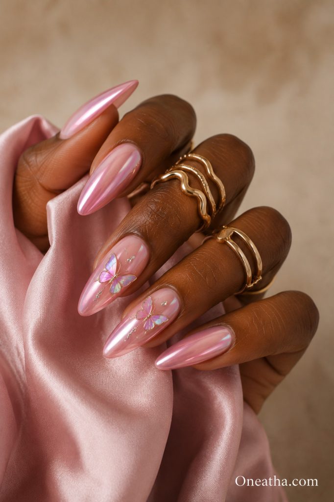 Pink butterfly nails by Oneatha.