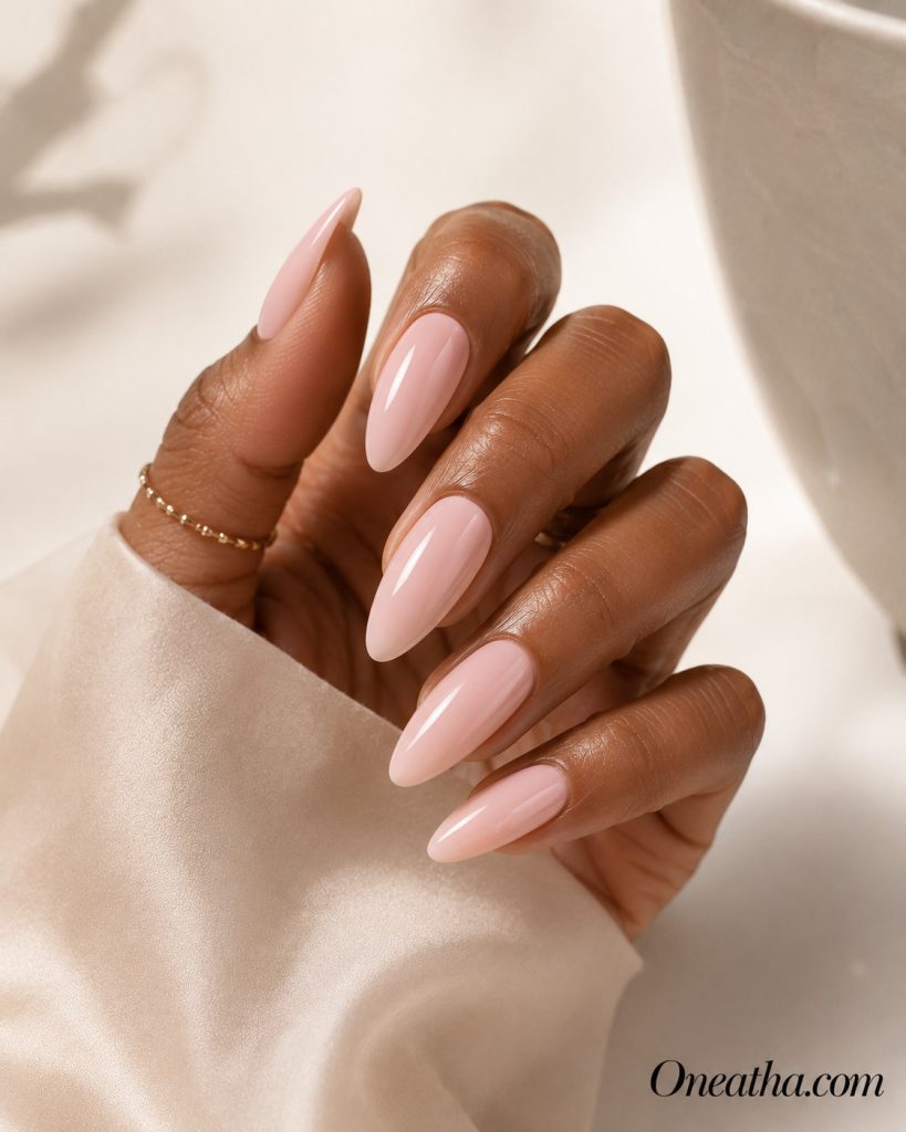 Pink glossy wedding nails by Oneatha.