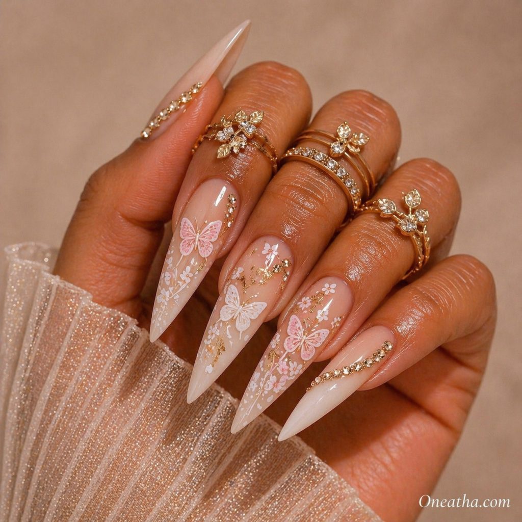 Butterfly stiletto nails by Oneatha.